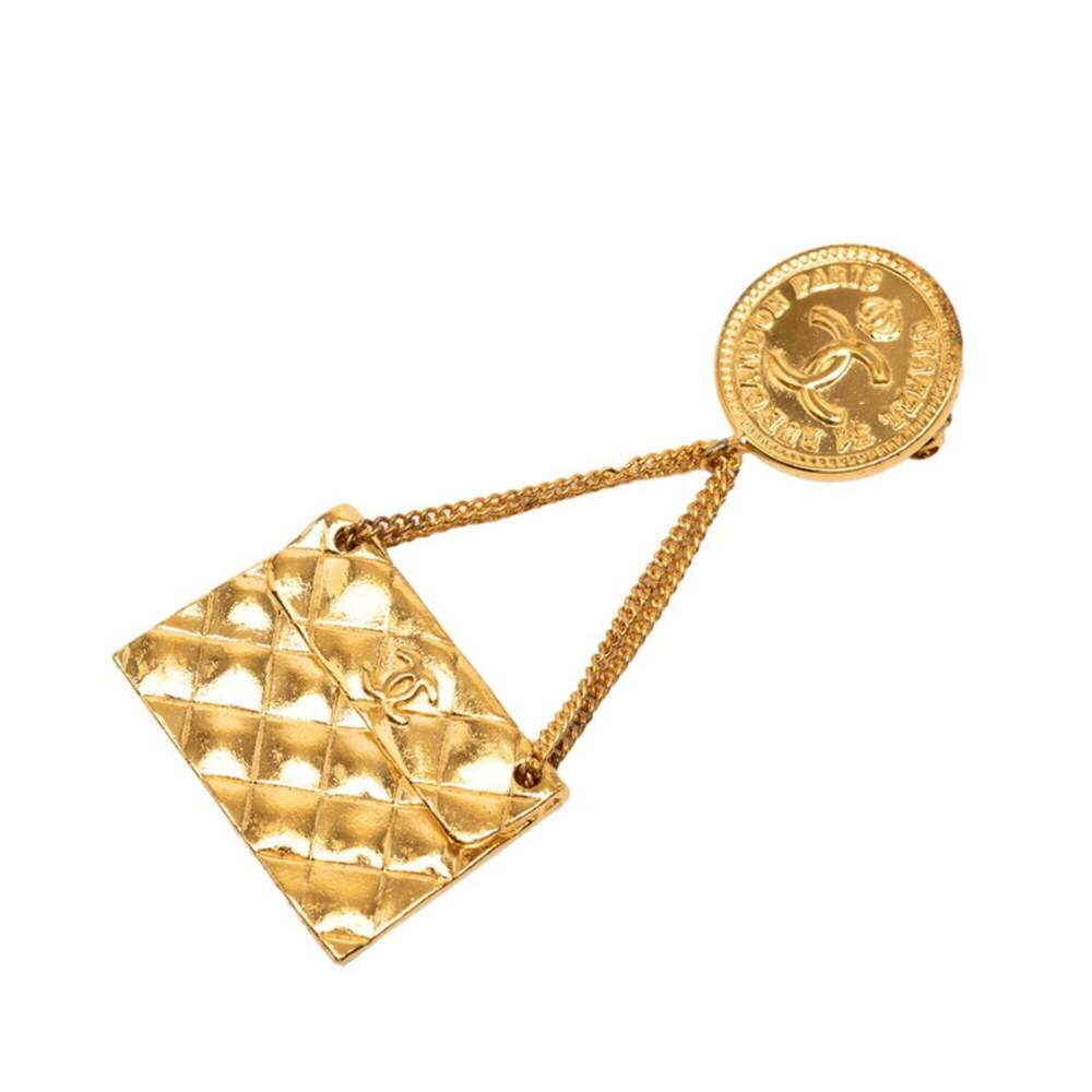 CHANEL Vintage Gold Logo Brooch